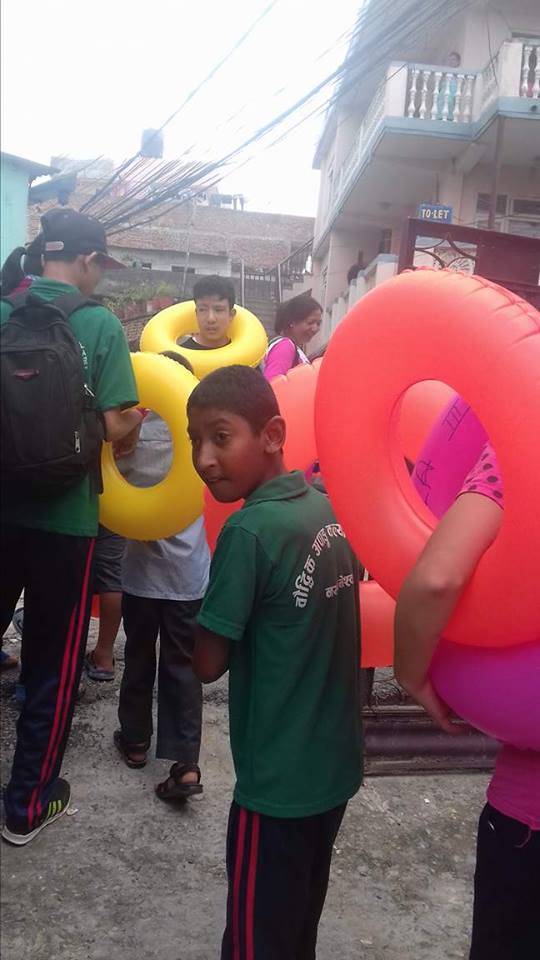 Children of the disability centre with their rubber rings