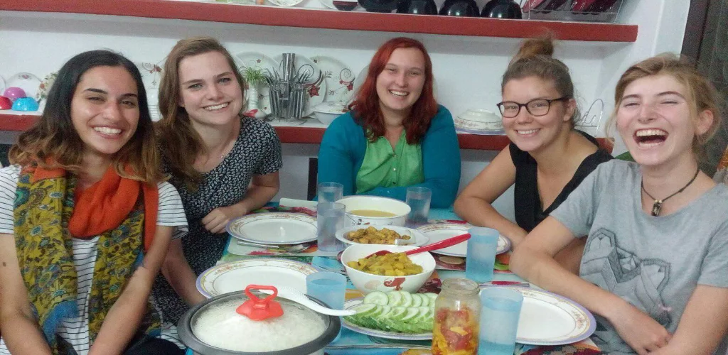 volunteer having home made nepali food at local homestay