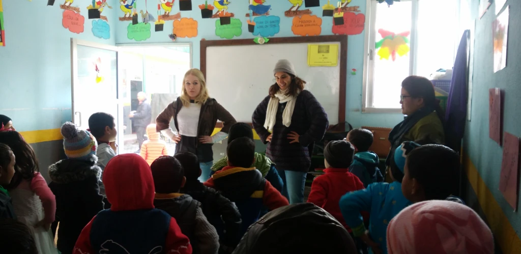 two volunteer teaching english school in nepal