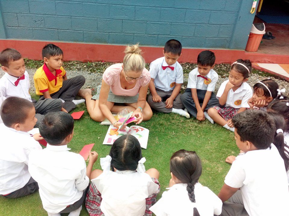 Book Project to Donate to School Libraries 1 Volunteer teaching at school in Pokhara