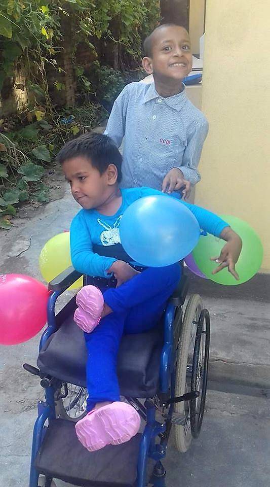 Children at the centre celebrating with balloons!