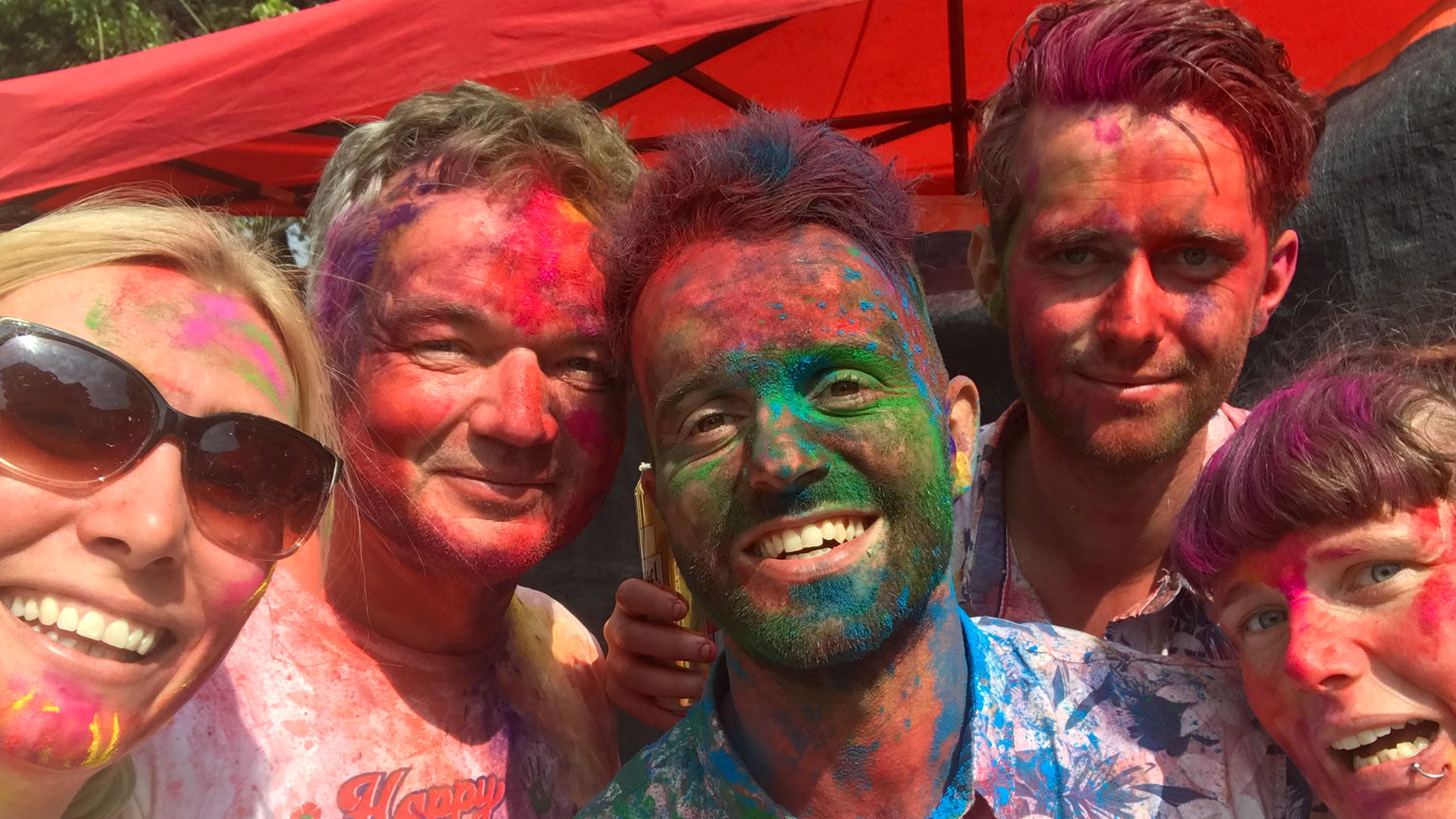 volunteers celebrating the holi festival